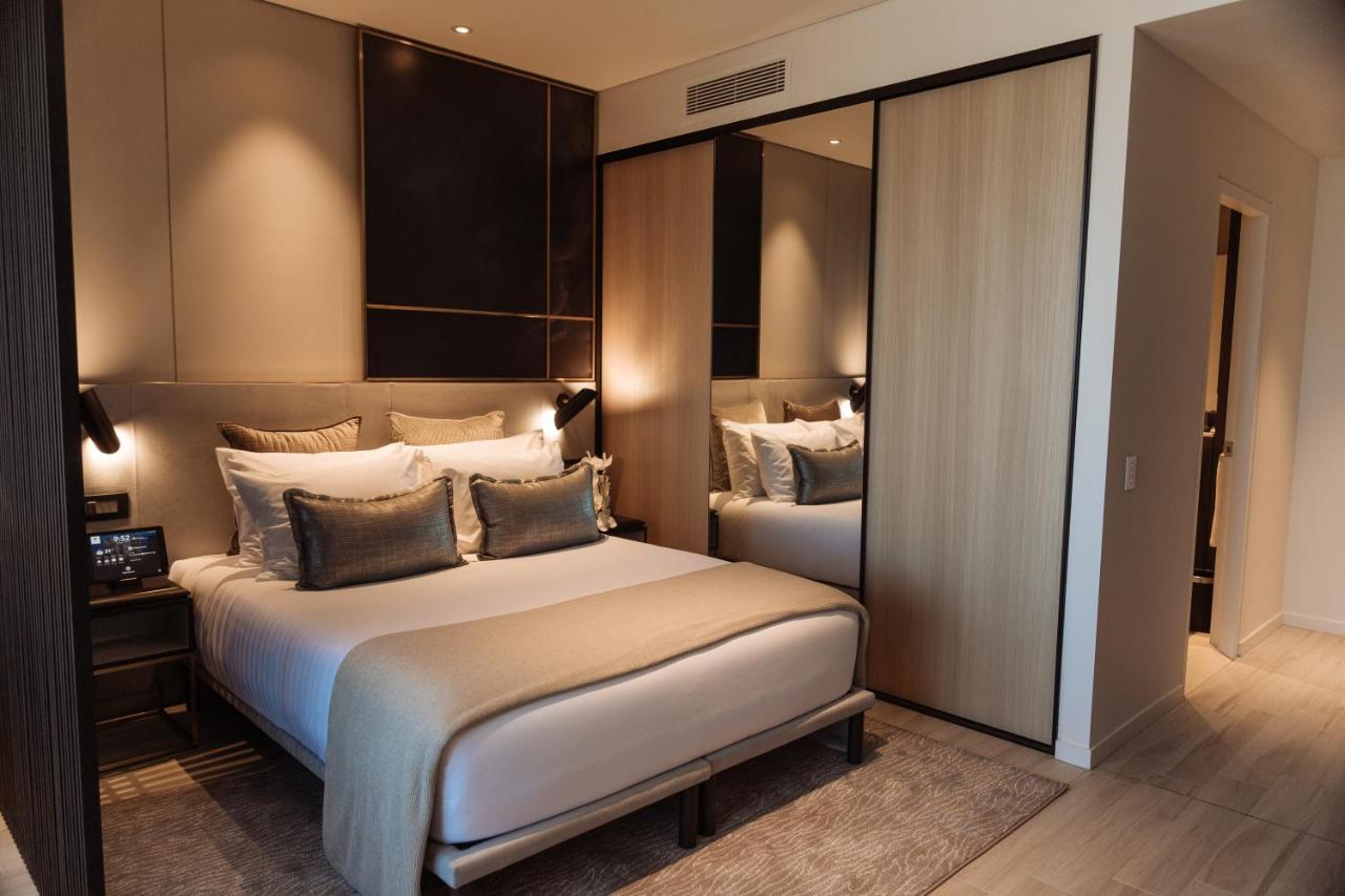 天空之城套房绿色广场酒店 悉尼 外观 照片 A bedroom at the hotel